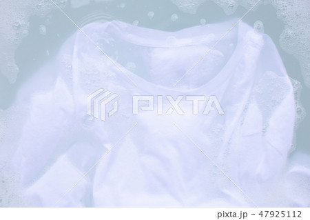 Soak cloth before washing, white t-shirt Soak cloth before washing, white t-shirt 47925112