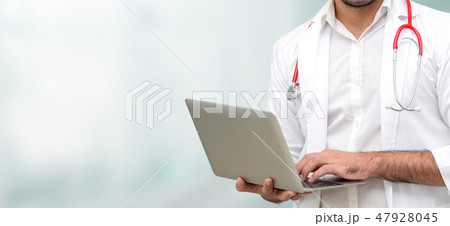 Doctor using laptop computer at the hospital. Doctor using laptop computer at the hospital. 47928045