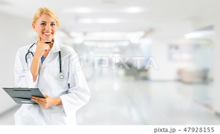 Woman doctor working at the hospital office. Woman doctor working at the hospital office. 47928155