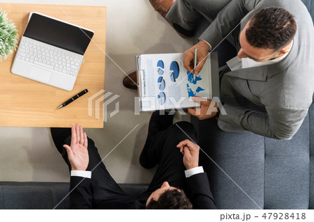 Businessmen are in business meeting in office. 47928418