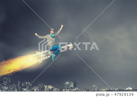 Girl on rocket 47929139