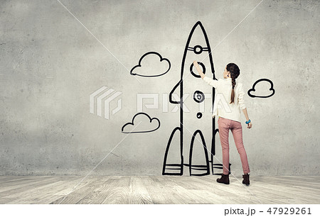 Girl drawing rocket Girl drawing rocket 47929261