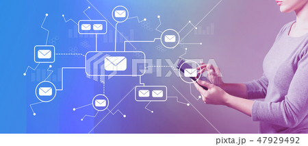 Emails with woman using a tablet 47929492
