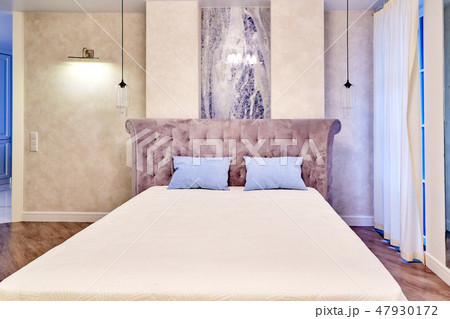 Big comfortable double bed in elegant luxary bedroom Big comfortable double bed in elegant luxary bedroom 47930172