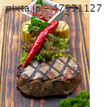 Barbecue meat steak composition. Grilled steak with red hot pepper, herb, corn and tomato sauce on 47931127