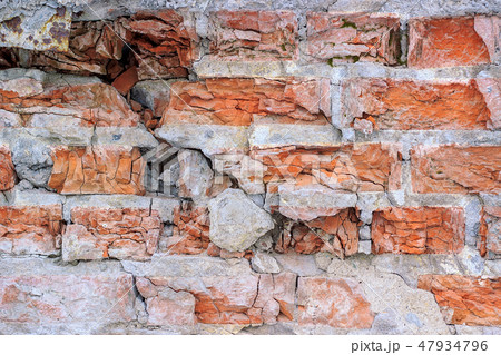 Destroyed brick wall, background. Destroyed brick wall, background. 47934796