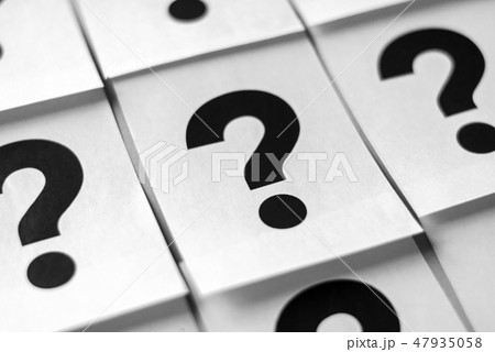 Black question marks on white sheets Black question marks on white sheets 47935058