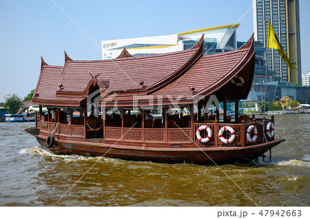 Thai wooden boat with traditional roof in Chao Phr 47942663