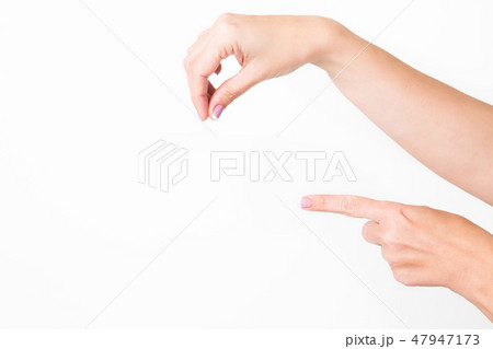 female hands holding nothing isolated  47947173