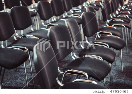 chairs in a row in the auditorium 47950462