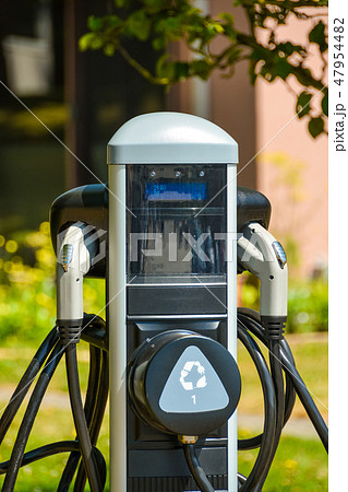 Electric car charging point installed on bright sunny day Electric car charging point installed on bright sunny day 47954482
