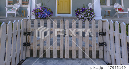 Picket fence of home with porch in Daybreak Utah 47955149