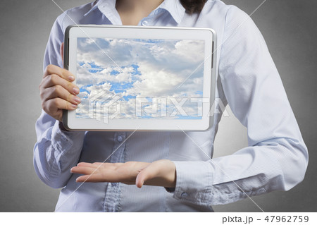 Woman use tablet device 47962759