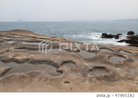 Honeycomb weathering and mushroom rocks 47965282