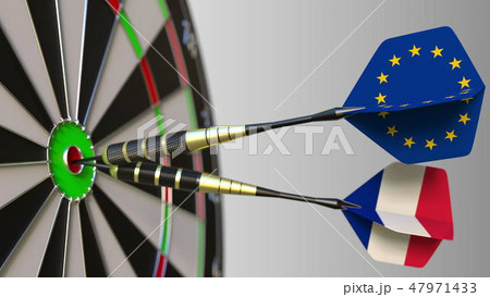 Flags of the European Union and France on darts hitting bullseye of the target. International Flags of the European Union and France on darts hitting bullseye of the target. International 47971433