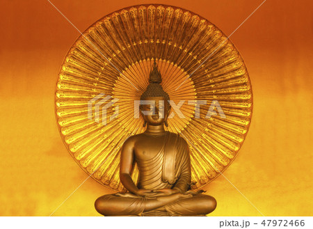 Golden buddha meditation with gold background. Golden buddha meditation with gold background. 47972466