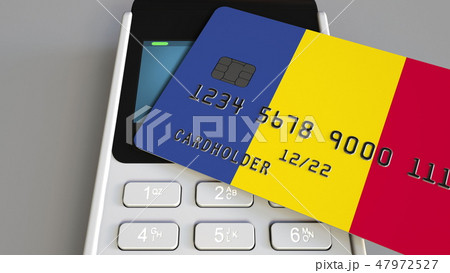 Payment terminal with credit card featuring flag of Romania. Romanian national banking system 47972527