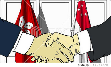 Businessmen or politicians shake hands against flags of Hong Kong and Singapore. Official meeting or 47975826