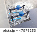 Water pipe and meter with waterspout on floor. 47976253