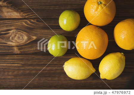 Fresh lemons, limes and oranges 47976972