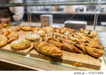 Croissant, puffs and other pastries. Showcase desserts in an Italian cafe or trattoria. Variety of 47977068