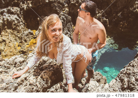 Man and woman fool around on nature Man and woman fool around on nature 47981318