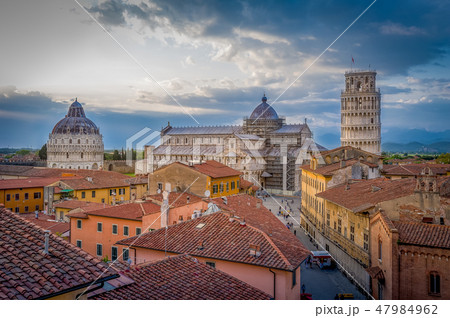 Sunset aerial view of Pisa historic center with famous leaning tower and Duomo di Pisa cathedral. 47984962