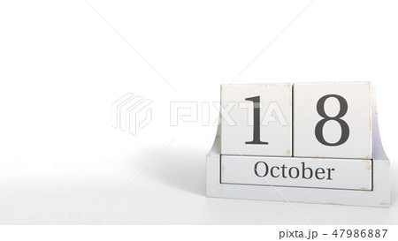 Wood cube calendar shows October 18 date, 3D rendering 47986887