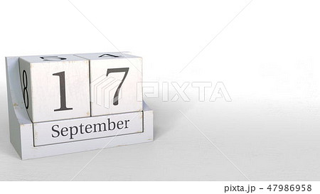 Wooden blocks calendar shows September 17 date, 3D rendering 47986958