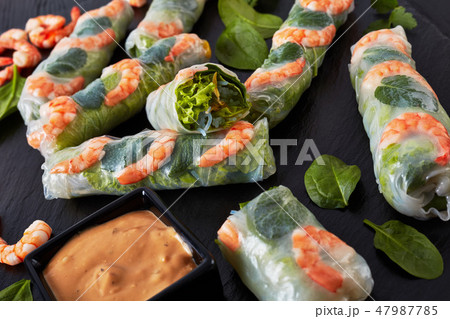 Spring Rolls on a slate tray, close-up Spring Rolls on a slate tray, close-up 47987785