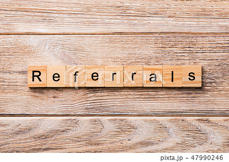REFERRALS word written on wood block 47990246