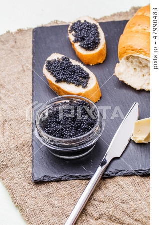 Photo of black caviar, knife Photo of black caviar, knife 47990483