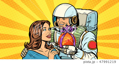 Couple in love. Astronaut gives a woman Mars Couple in love. Astronaut gives a woman Mars 47991219