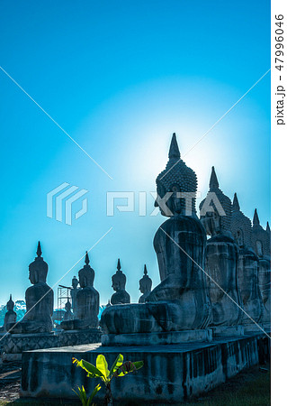 a lot of big Buddha statues in blue sky 47996046