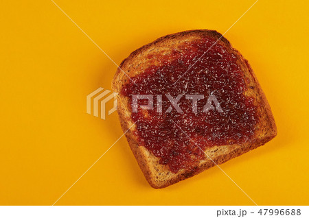 Toast with jelly on top 47996688