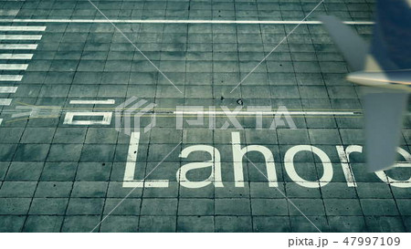 Aerial view of an airplane arriving to Lahore airport. Travel to Pakistan 3D rendering 47997109