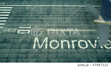 Aerial view of an airplane arriving to Monrovia airport. Travel to Liberia 3D rendering 47997222