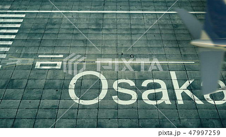 Aerial view of an airplane arriving to Osaka airport. Travel to Japan 3D rendering 47997259