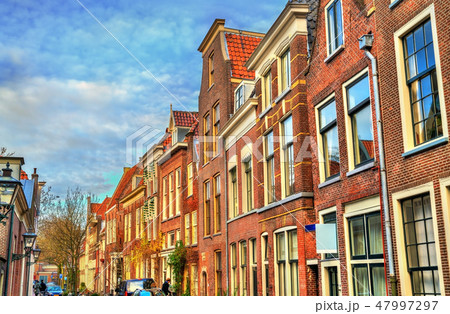 Traditional dutch houses on a street of Leiden, Holland 47997297