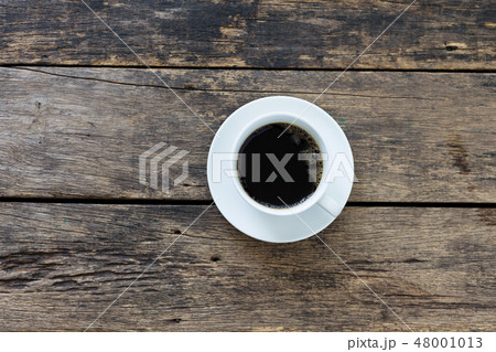 coffee cup on wooden table top view 48001013