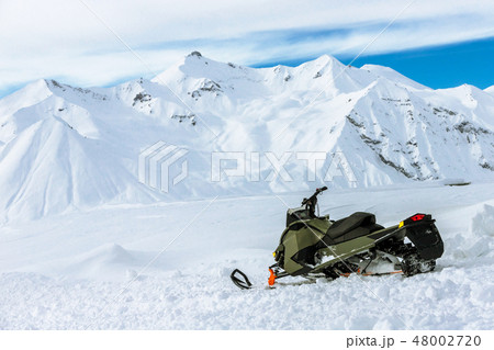Snowmobile in the winter Georgian mountains, Gudauri 48002720