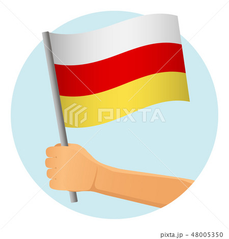 south ossetia flag in hand 48005350