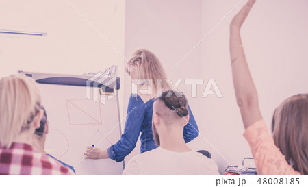 Teacher teaching mathematics to college students Teacher teaching mathematics to college students 48008185