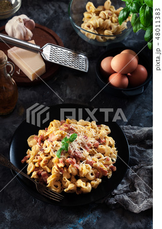Fresh tortellini with homemade carbonara sauce 48011383