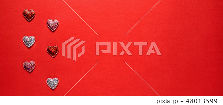 Sparkle hearts on red background. Sparkle hearts on red background. 48013599
