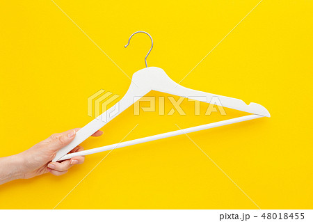 White hangers background for sale shopping concept White hangers background for sale shopping concept 48018455