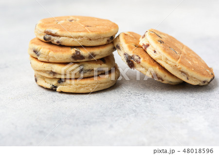 Stack of welsh cakes on off white 48018596