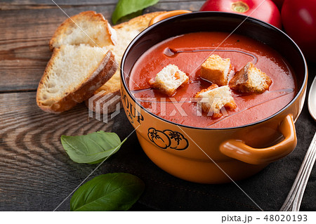 Homemade tomato soup with Basil. Homemade tomato soup with Basil. 48020193