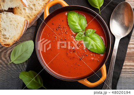 Homemade tomato soup with Basil. Homemade tomato soup with Basil. 48020194