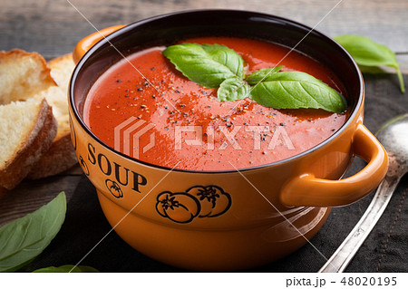 Homemade tomato soup with Basil. 48020195